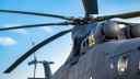 Military helicopter against a blue sky
