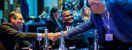 Empowering Global Trade Conference Business Men Shaking Hands (1)