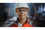 Woman in hard hat facing the camera, graphic design overlay