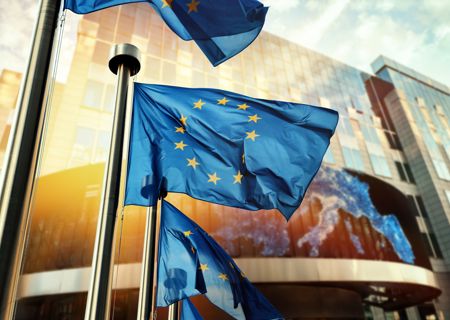 Euflagsinfrontofbuilding